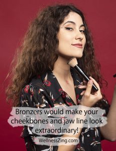 Apply Bronzer with Brush on Cheeks